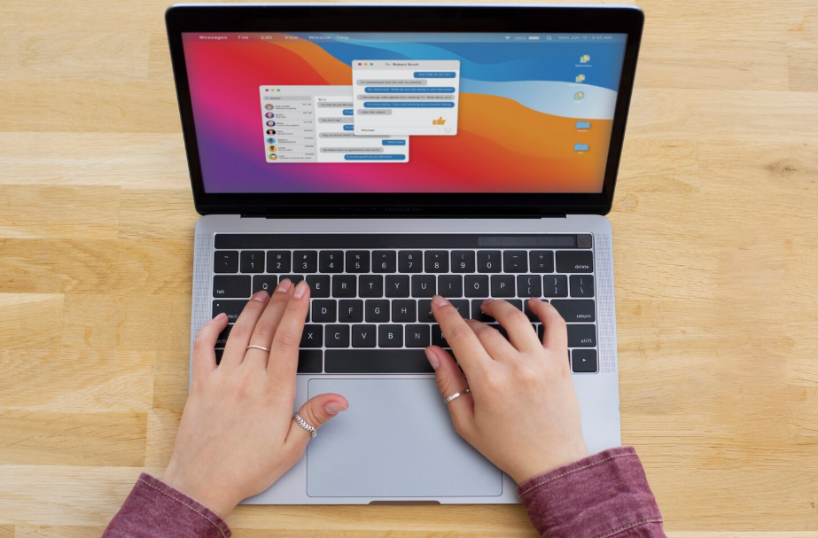 Laptop with apps open on screen, representing how the best browser extensions save time and improve productivity.