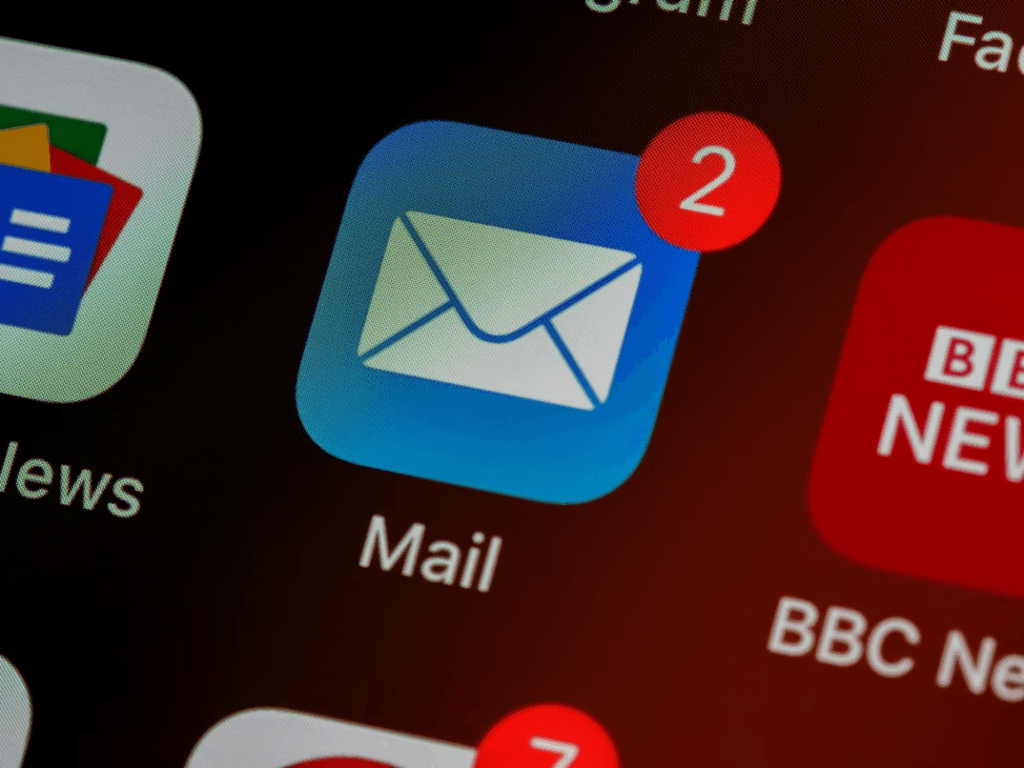 Close-up of a Mail app icon with new email notifications, representing potential phishing emails.