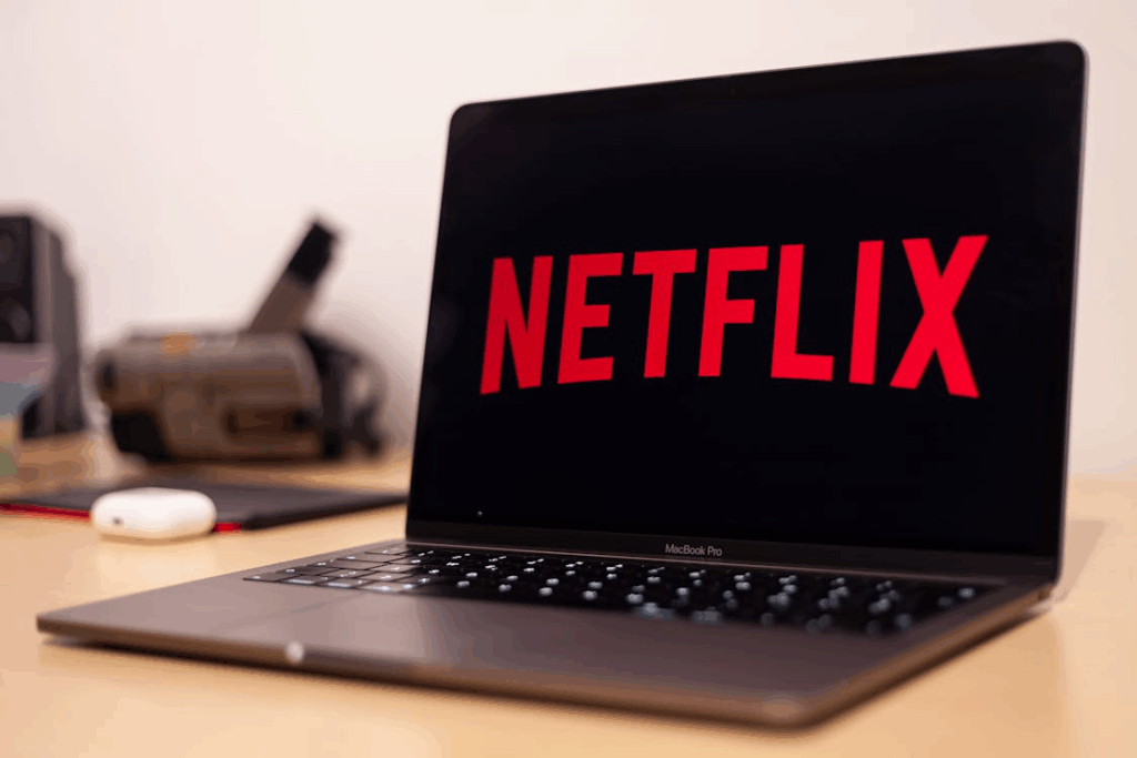 Laptop screen displaying the Netflix logo, symbolizing digital subscriptions.