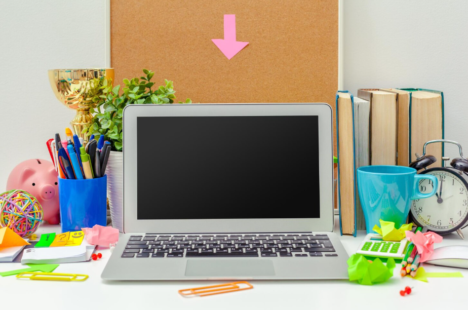 Budget-friendly student laptop on a colorful study desk with books
