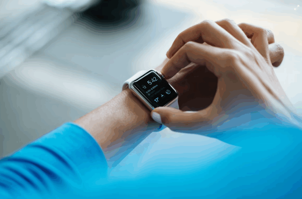 Person using a smartwatch to track health and fitness data